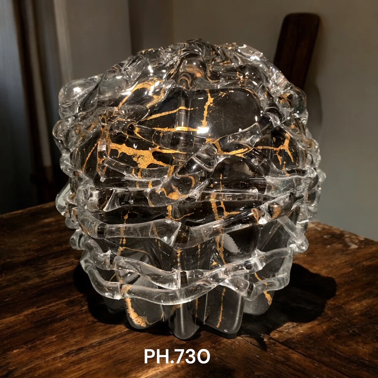 Wikkel design urn Zwart / goud